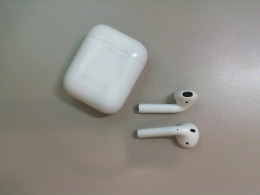 Wireless headphones, with charging case, not new