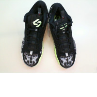 Black men's sneakers with green soles
