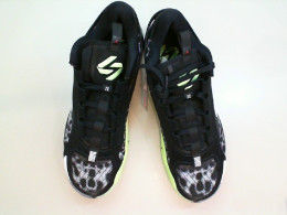 Black men's sneakers with green soles