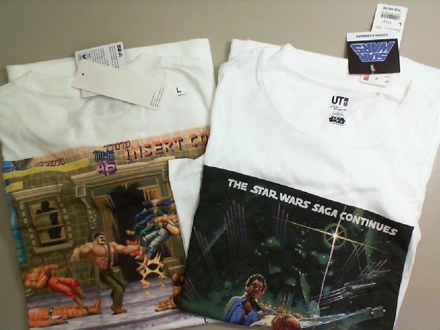 Set of 2 white UniQlo T-shirts, with a graphic, Size L Set of 2 white UniQlo T-shirts, with a graphic, Size L