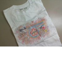 White T-shirt, with a pattern, size S. UniQlo White T-shirt, with a pattern, size S. UniQlo