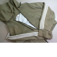 Snappy green short jacket with hood Snappy green short jacket with hood