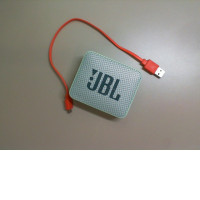 Small JBL speaker + charging cable