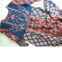 Dress with ornaments and bead embroidery