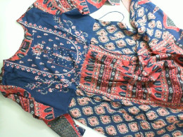 Dress with ornaments and bead embroidery Dress with ornaments and bead embroidery