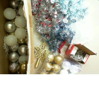 New Year's set of decorations for the Christmas tree. Light bulbs, tinsel, plastic balls
