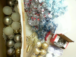 New Year's set of decorations for the Christmas tree. Light bulbs, tinsel, plastic balls New Year's set of decorations for the Christmas tree. Light bulbs, tinsel, plastic balls