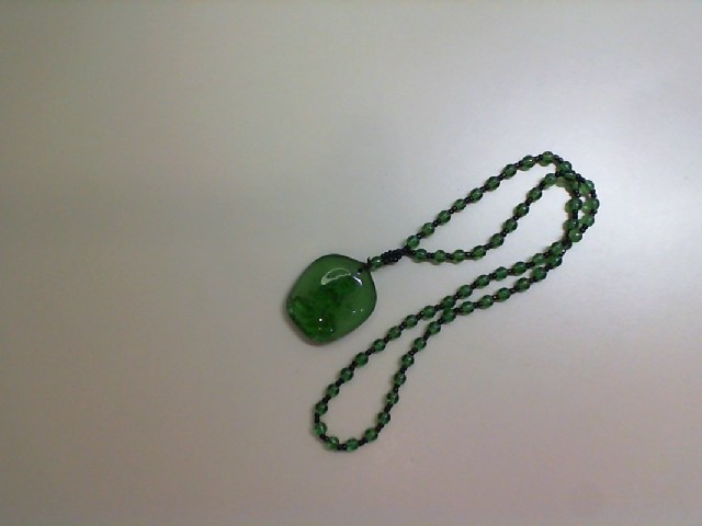 Plastic bead necklace with pendant Plastic bead necklace with pendant
