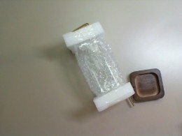 Glass square vase on a wooden stand