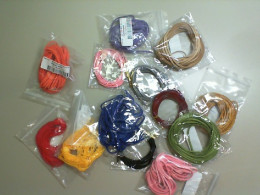 Set of 12 multi-colored cords for needlework