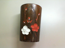 Wooden mug with flowers