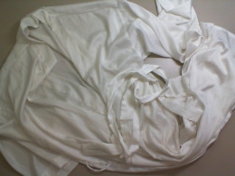 White housecoat, on the belt White housecoat, on the belt