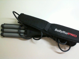 Curling iron for creating curls in a case Curling iron for creating curls in a case