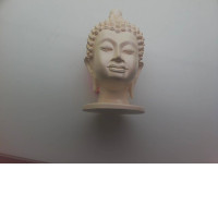 Souvenirs made of plaster with the image of Buddha