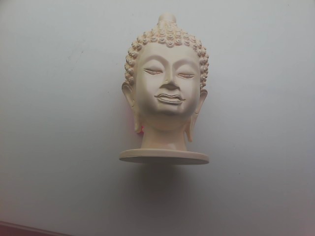 Souvenirs made of plaster with the image of Buddha Souvenirs made of plaster with the image of Buddha