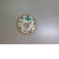 Wicker coaster with elephant pattern