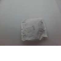 Lego construction set in a paper bag Lego construction set in a paper bag