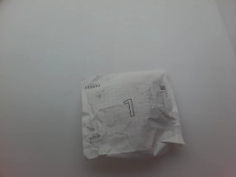 Lego construction set in a paper bag