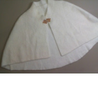 Knitted shoulder cape