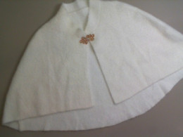 Knitted shoulder cape