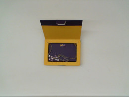 necklace in a yellow box