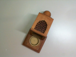 Wooden stand in the form of a candle lantern