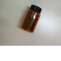 Aroma cones with apple scent in a plastic jar