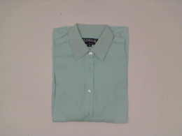 Light blue long-sleeved collared shirt