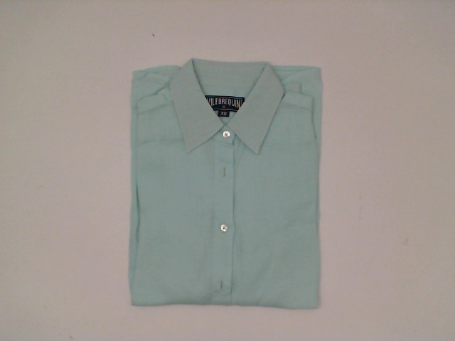 Light blue long-sleeved collared shirt Light blue long-sleeved collared shirt