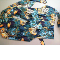 Bright women's blouse with a belt