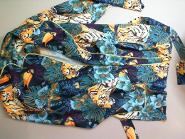 Bright women's blouse with a belt Bright women's blouse with a belt