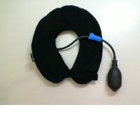Travel neck pillow with hand pump