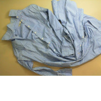 Blue dress, buttoned, long sleeves Blue dress, buttoned, long sleeves