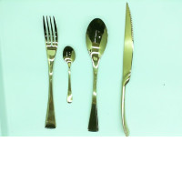 A large set of kitchen utensils consisting of a fork, a knife, a teaspoon and a tablespoon (for 15 people)