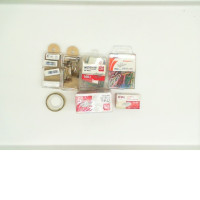 Set of office supplies: eraser, staples, paper clips, tape