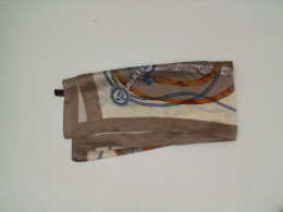 Cream colored scarf with blue pattern Cream colored scarf with blue pattern