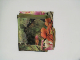 Gold and black patterned scarf 