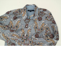 Light blue long-sleeved collared shirt with pattern Light blue long-sleeved collared shirt with pattern