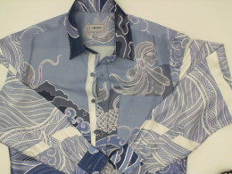 Light blue long-sleeved shirt with sea pattern