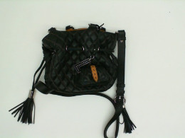 Black women's LANCEL handbag