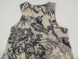 Long white dress with black pattern