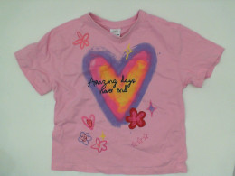 Pink children's shirt with heart pattern