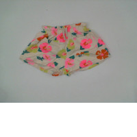 Cream colored children's pants with patterns Cream colored children's pants with patterns