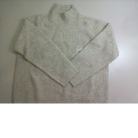 Women's knitted sweater with a high neck