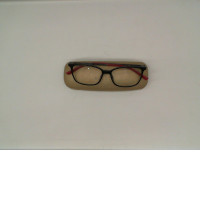 Eyeglasses in a gold box Eyeglasses in a gold box