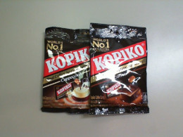 Set of 2 bags of candies, lollipops