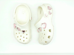 White children's crocs with hearts