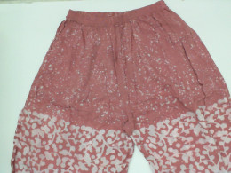 Pink shorts with white stripes Pink shorts with white stripes