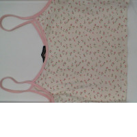 Women's white tank top with red pattern