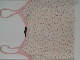 Women's white tank top with red pattern